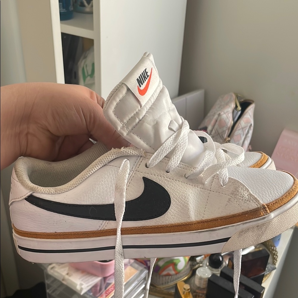 Nike White and Black Sneakers with Gold Accents women’s court legacy